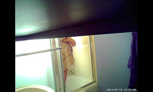 Son sets up spycam in shower to watch mom's massive billibongs