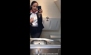 Latina stewardess joins the masturbation mile high club in the throne-room and cums