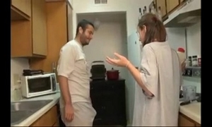 Brother and sister oral job in the kitchen