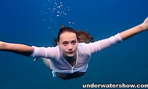 Julia swimming bare in the sea