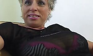 Old German chick with huge natural tits playing with her sex toy