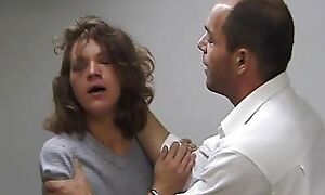 Policeman searches with his hand in her vagina