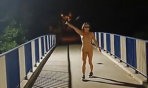 Crazy milf totally naked over the highway. She was pissed on her clothes.