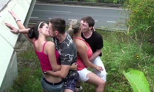 Cum on a overweight wife with large wobblers in extraordinary public foursome sex by a highway